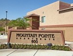 a mountain pointe sign in front of a building
