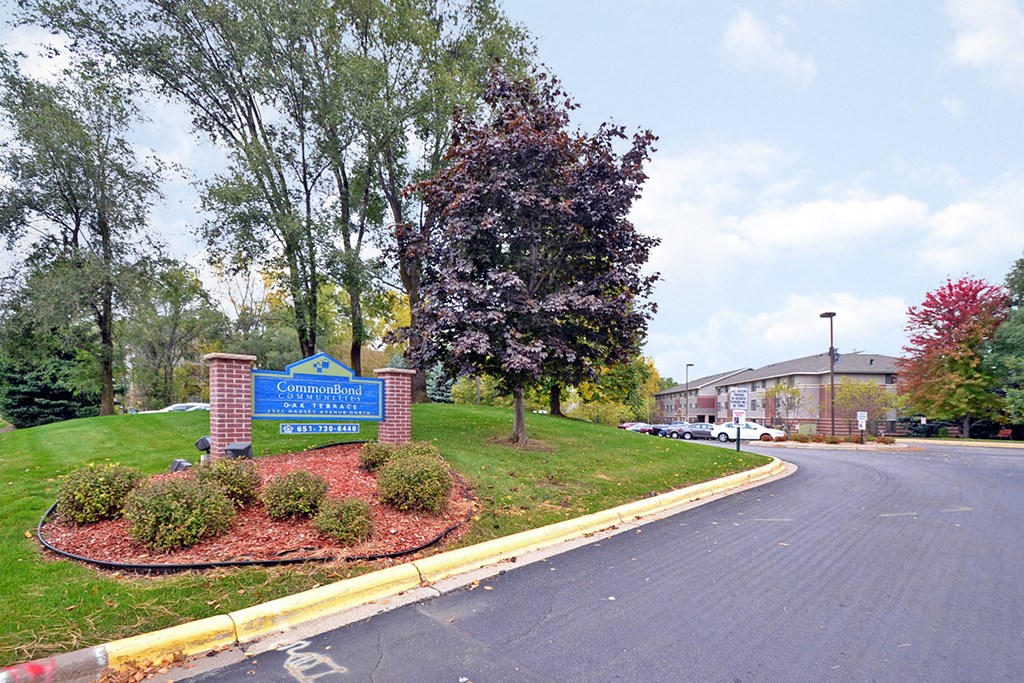 the entrance to the community center at the intersection of a street