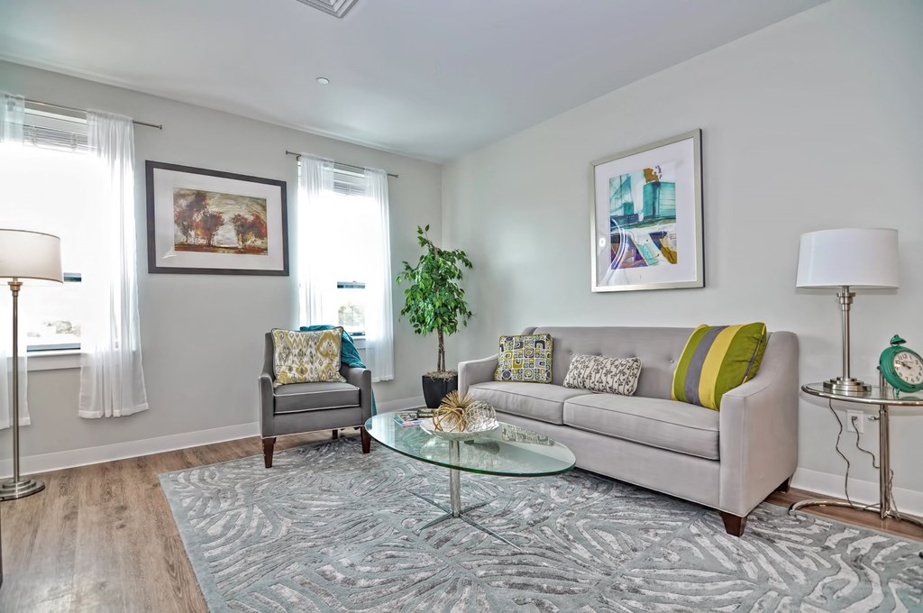 a living room with a couch and a table