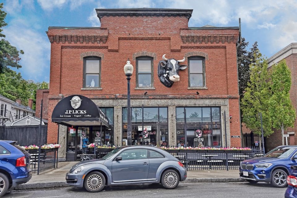 a brick building with a bulls head on the side of it