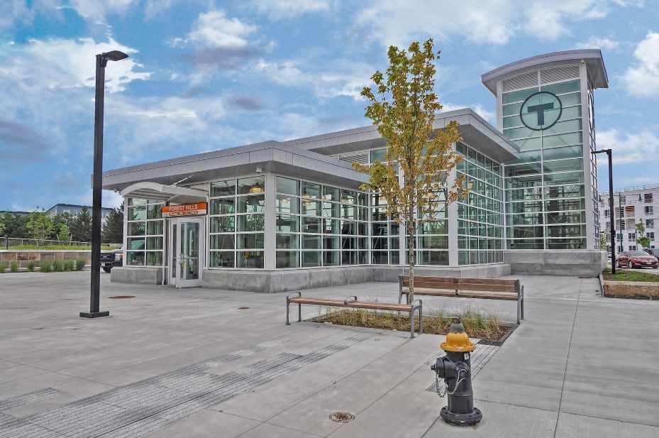 a fire hydrant in front of a large building
