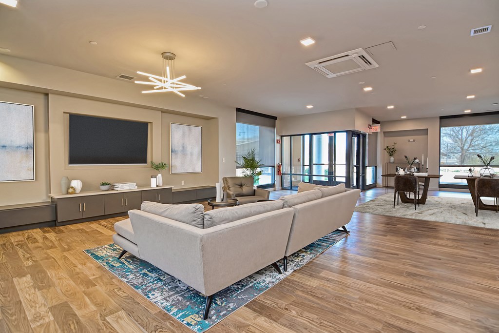 a living room with a couch and a tv