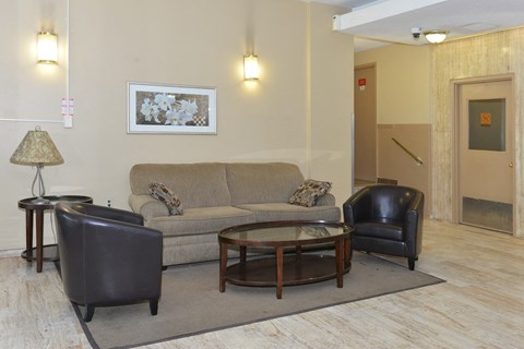 a living room with a couch and a coffee table