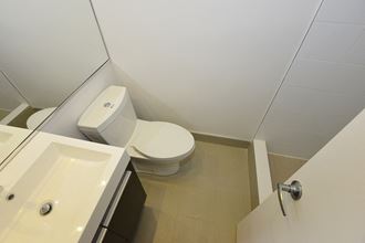 a small bathroom with a toilet and a sink