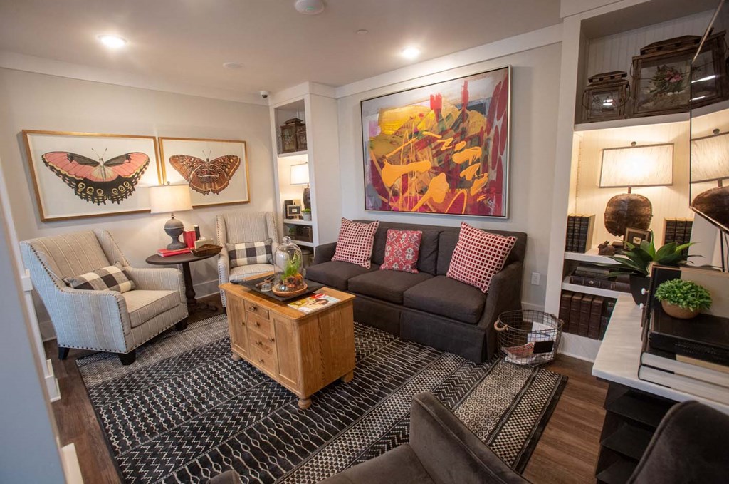 a living room with a couch and a table