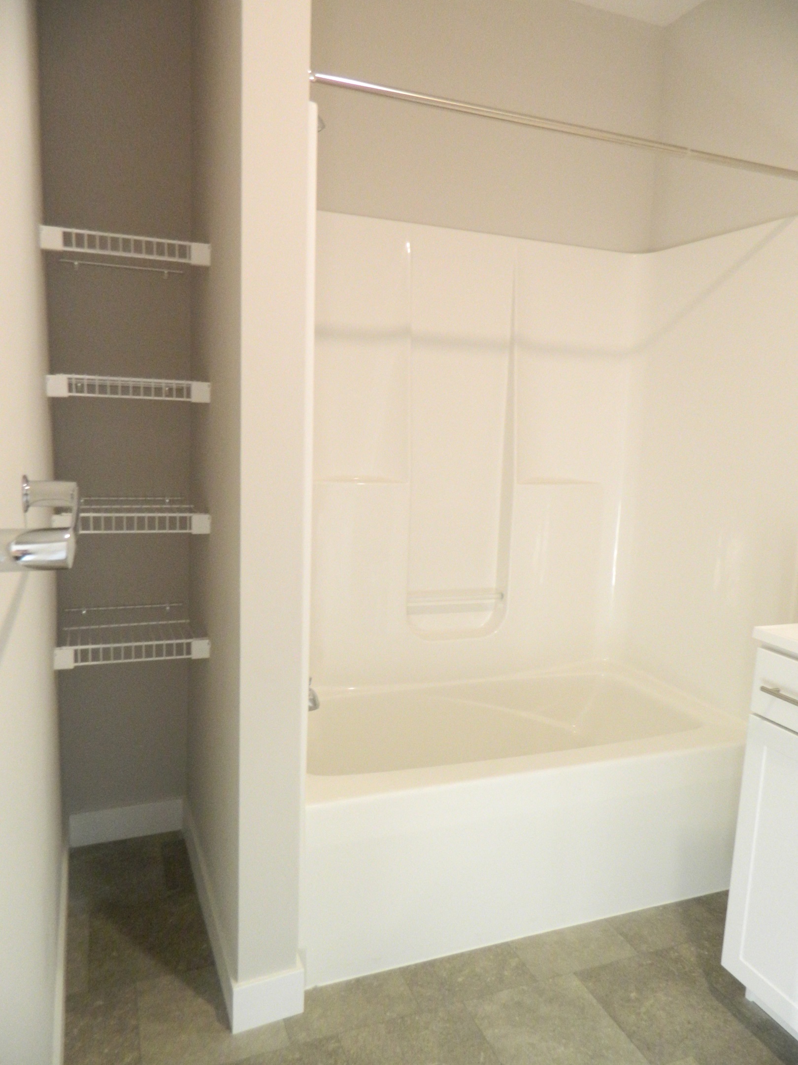 a small bathroom with a shower and a toilet