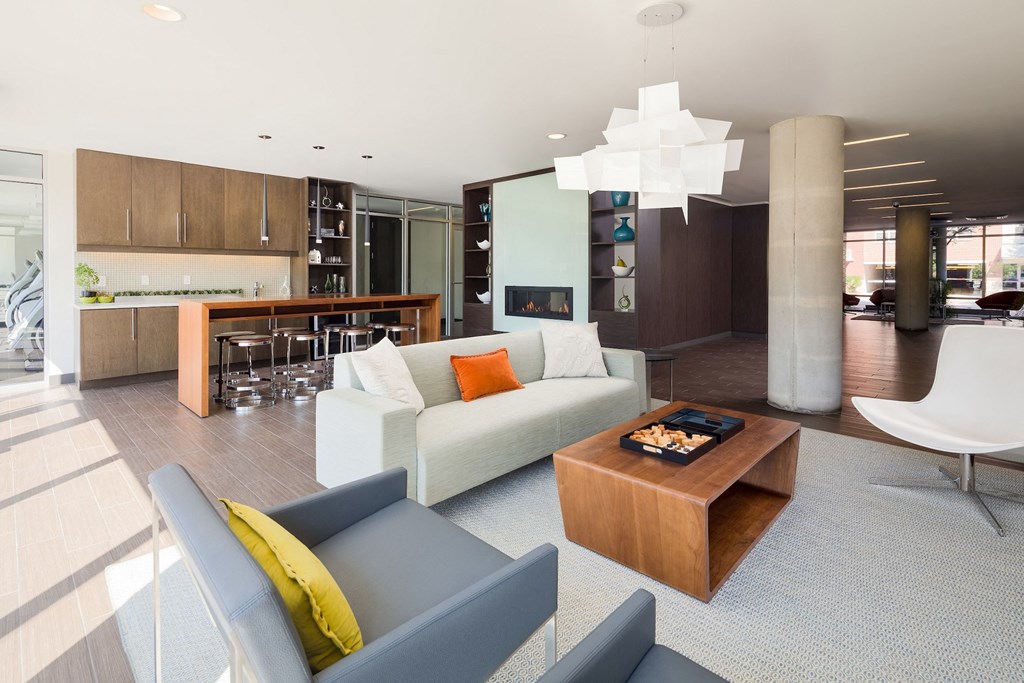 a living room with a white couch and a coffee table