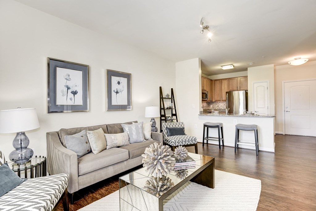 a living room with a couch and a table