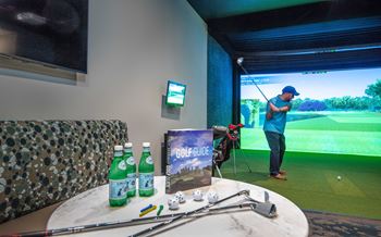 Golf simulator with lounge seating