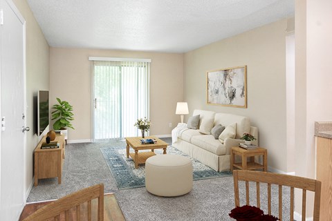 a living room with a couch and a table