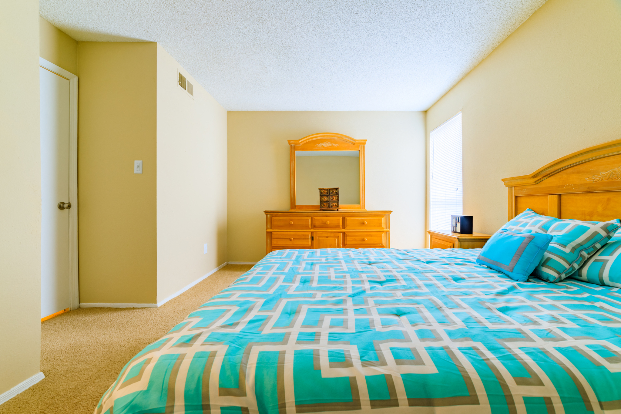Forest Lake at Oyster Point Newport News VA Guest Bedroom interior with teal bedding