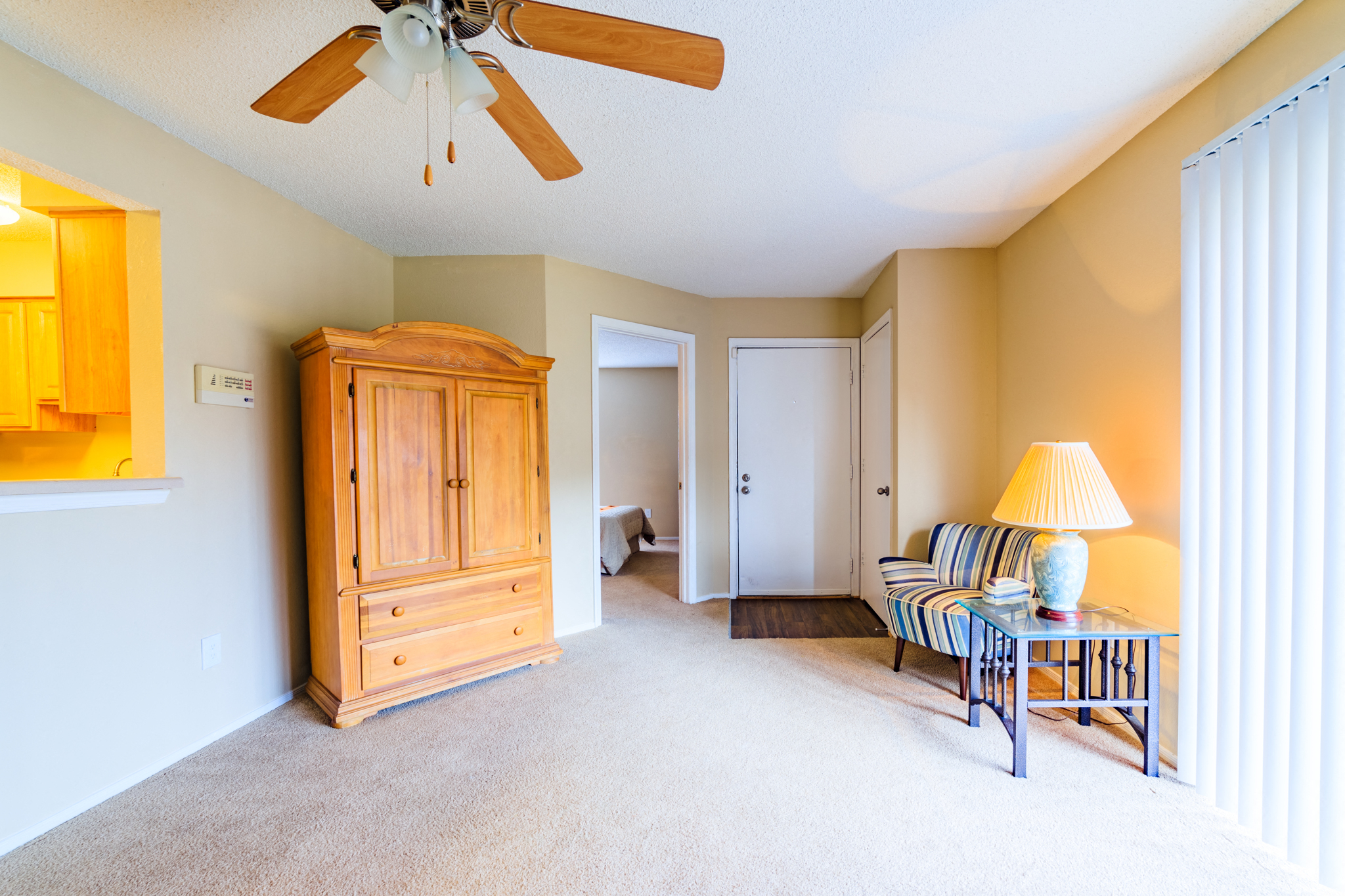 Forest Lake at Oyster Point Newport News, VA Living Room Interior with Armoire