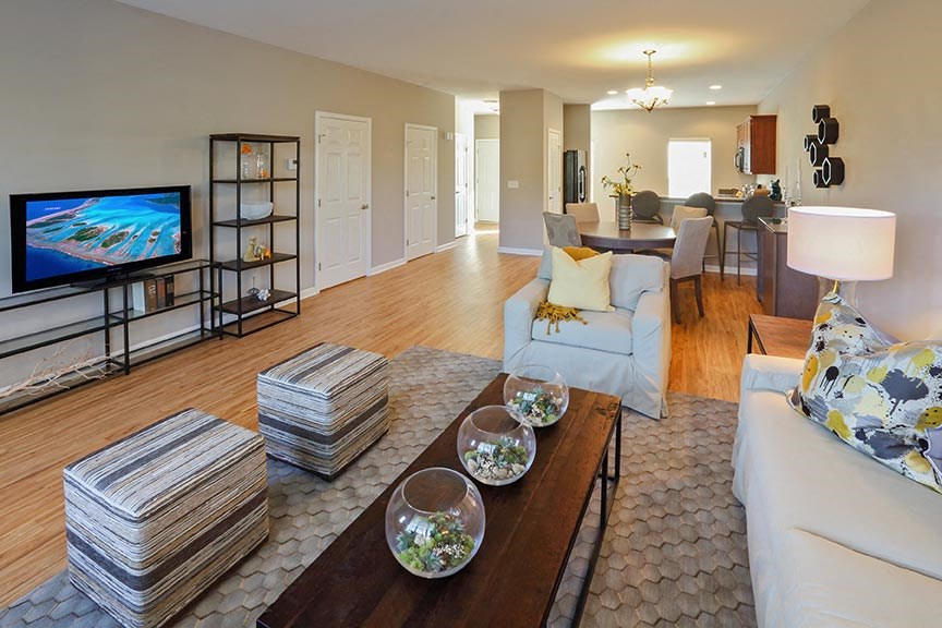 a living room with a couch and a table
