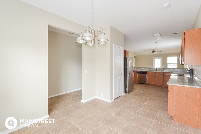 the kitchen and dining room are open to the living room