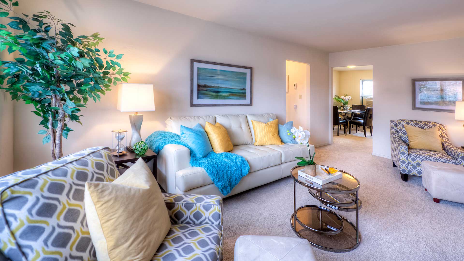 a living room with a couch and a table