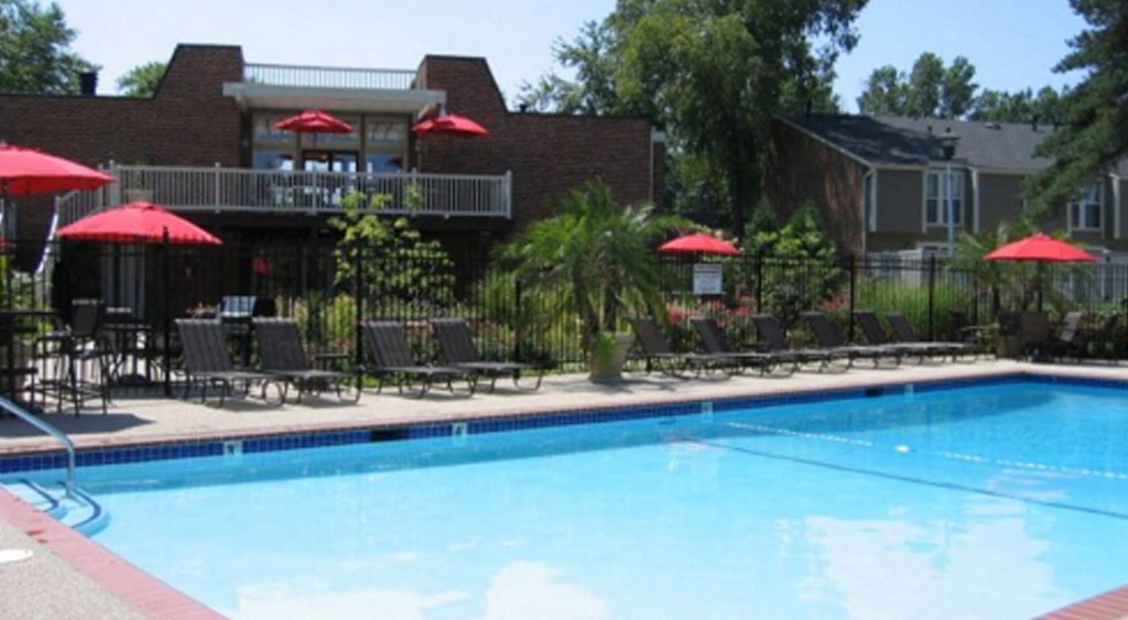 the swimming pool at the resort on a sunny day