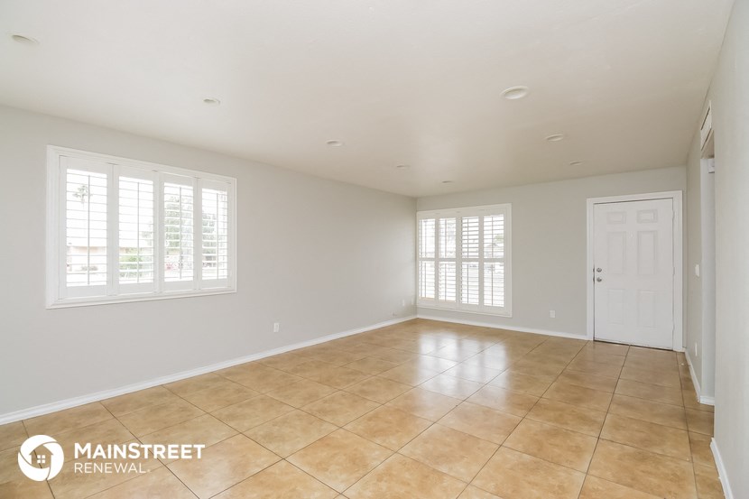 the spacious living room is clean and ready for you to use