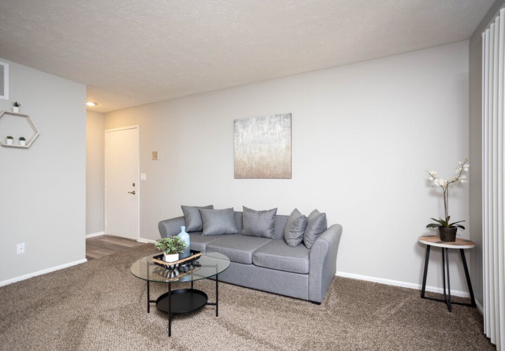 a living room with a couch and a coffee table