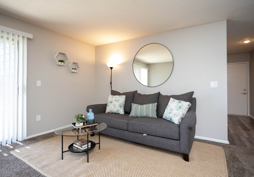 a living room with a couch and a coffee table