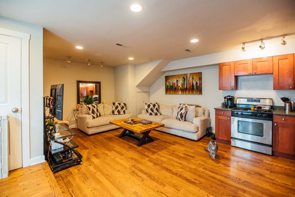 a living room with a couch and a table