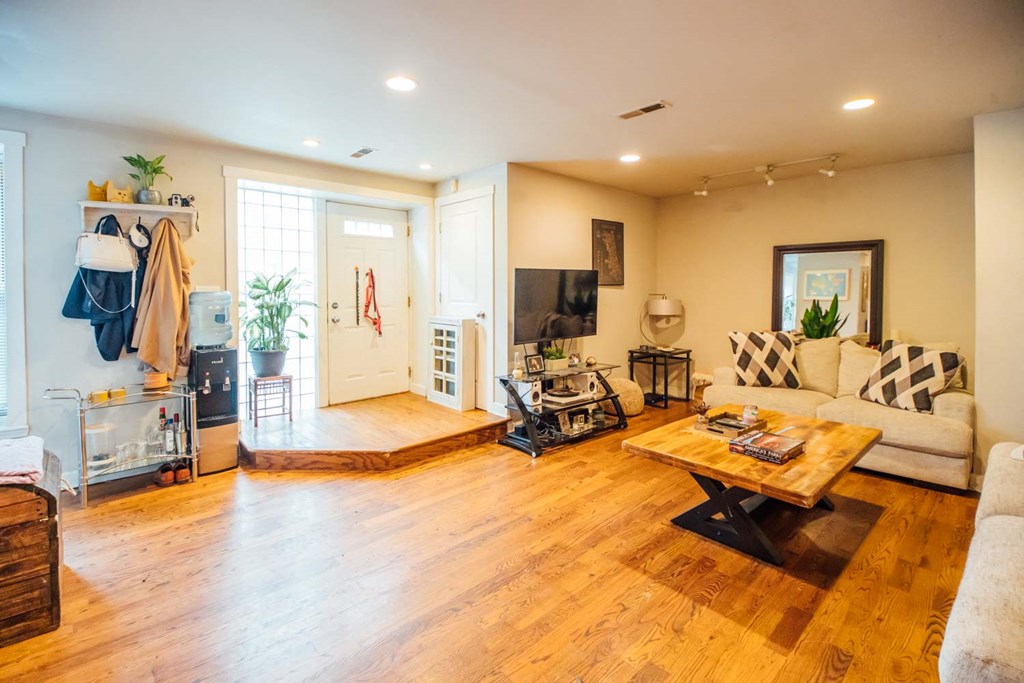 a living room with a couch and a table