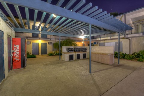a gas station with a bar and a coke machine