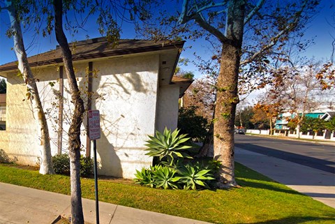 a building with a sign on the side of a street