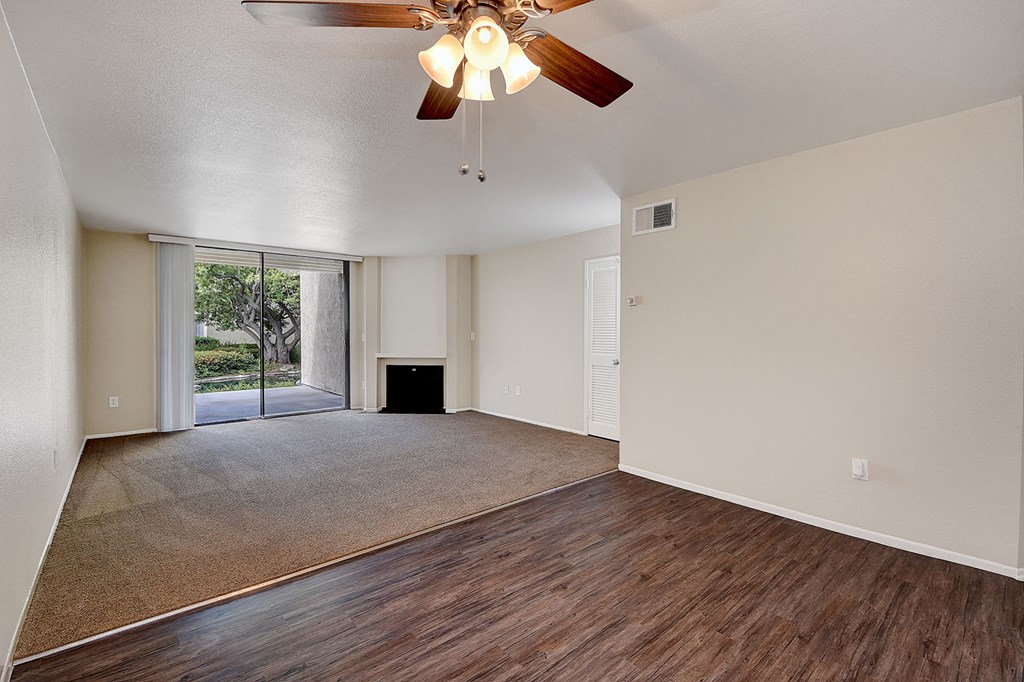 Living room and balcony at LAKE DIANNE, Santa Ana, California
