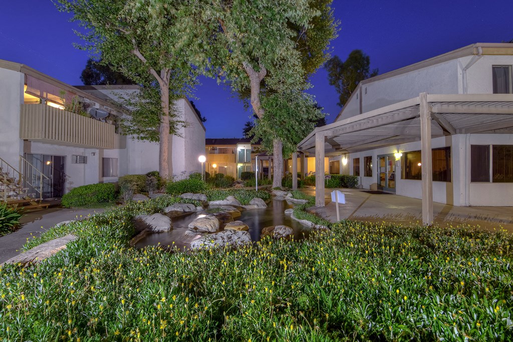 the courtyard at night at the residences at silver hill in suitland tx