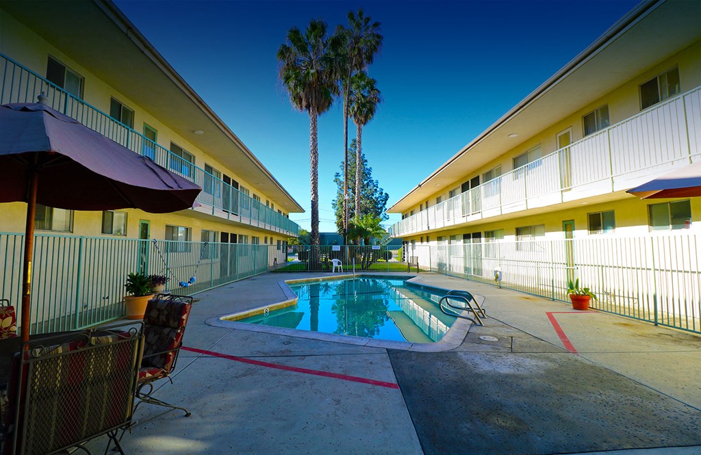 the pool is between the buildings