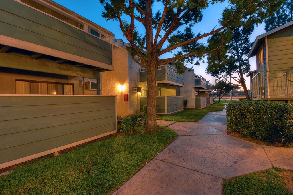the walkway between the residences at dusk