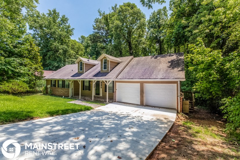 a home with a garage and a driveway