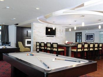 Clubroom with Billiards, HDTVs, Fireplace and Bar