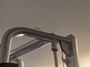 interior a gym with weights and other equipment in a building with windows