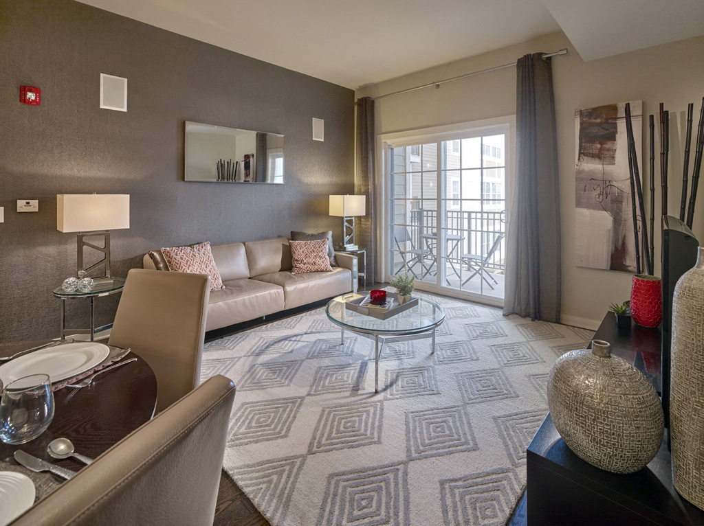 a living room with a couch and a table