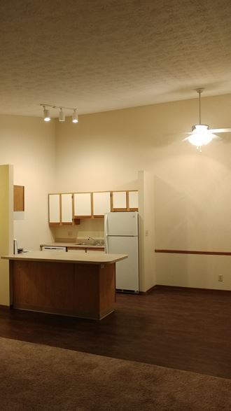 Image of kitchen with cabinets and appliances