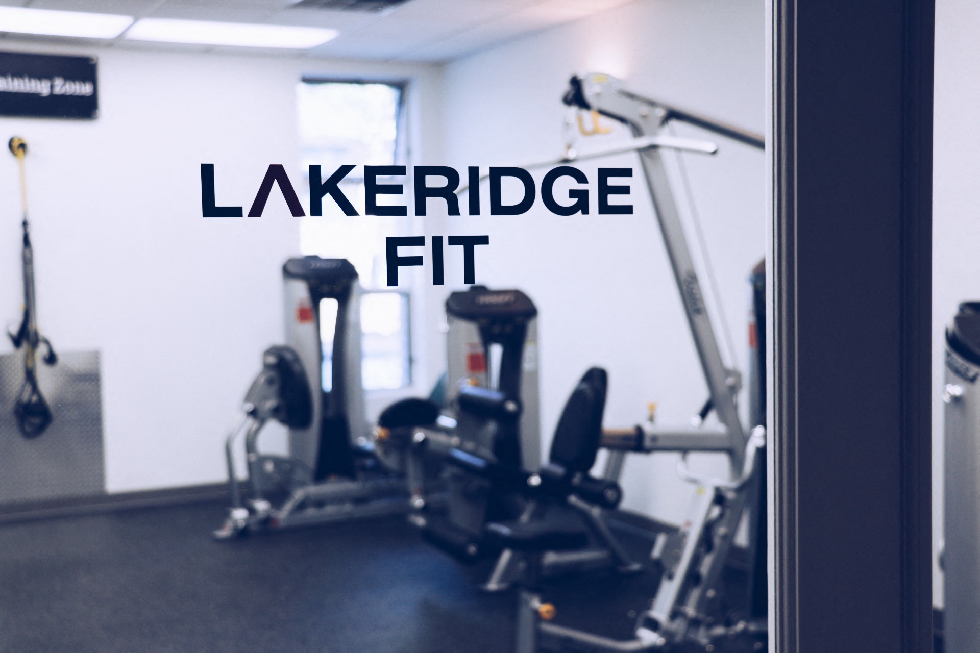 a gym with a sign that reads lakeside fit