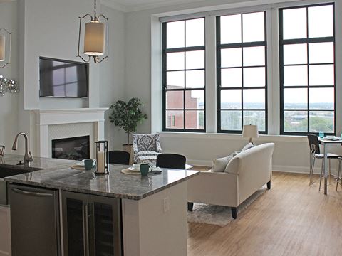 Luxury Vinyl Plank Flooring In Kitchen And Living Room at Residences at Halle, Cleveland