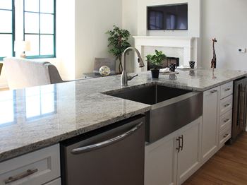 Granite countertops with farmhouse sinks at Residences at Halle, Ohio, 44113