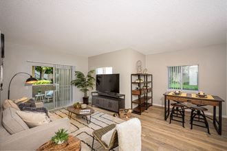 El Paseo_Apartments_Tustin_CA_living room with furniture and TV