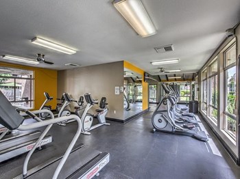 Axiom Tustin apartments fitness center elliptical Axiom Tustin apartments fitness center elliptical - Photo Gallery 4
