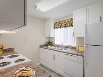 Crossing at Arroyo Trail Apartments Kitchen Counter and Appliances Crossing at Arroyo Trail Apartments Kitchen Counter and Appliances - Photo Gallery 2