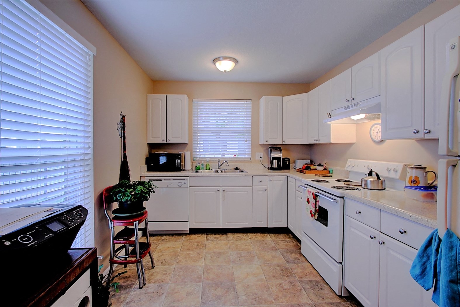 Image of kitchen with  cabinets and appliances