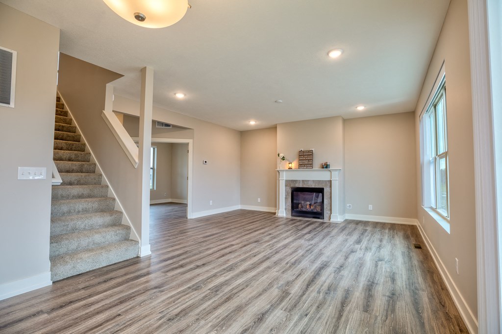 Kitchen and Living room of Home For Rent in Holt Michigan | Aspen Lakes Estates