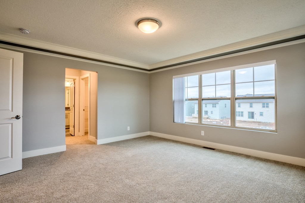 Master bedroom of Home For Rent in Holt Michigan | Aspen Lakes Estates