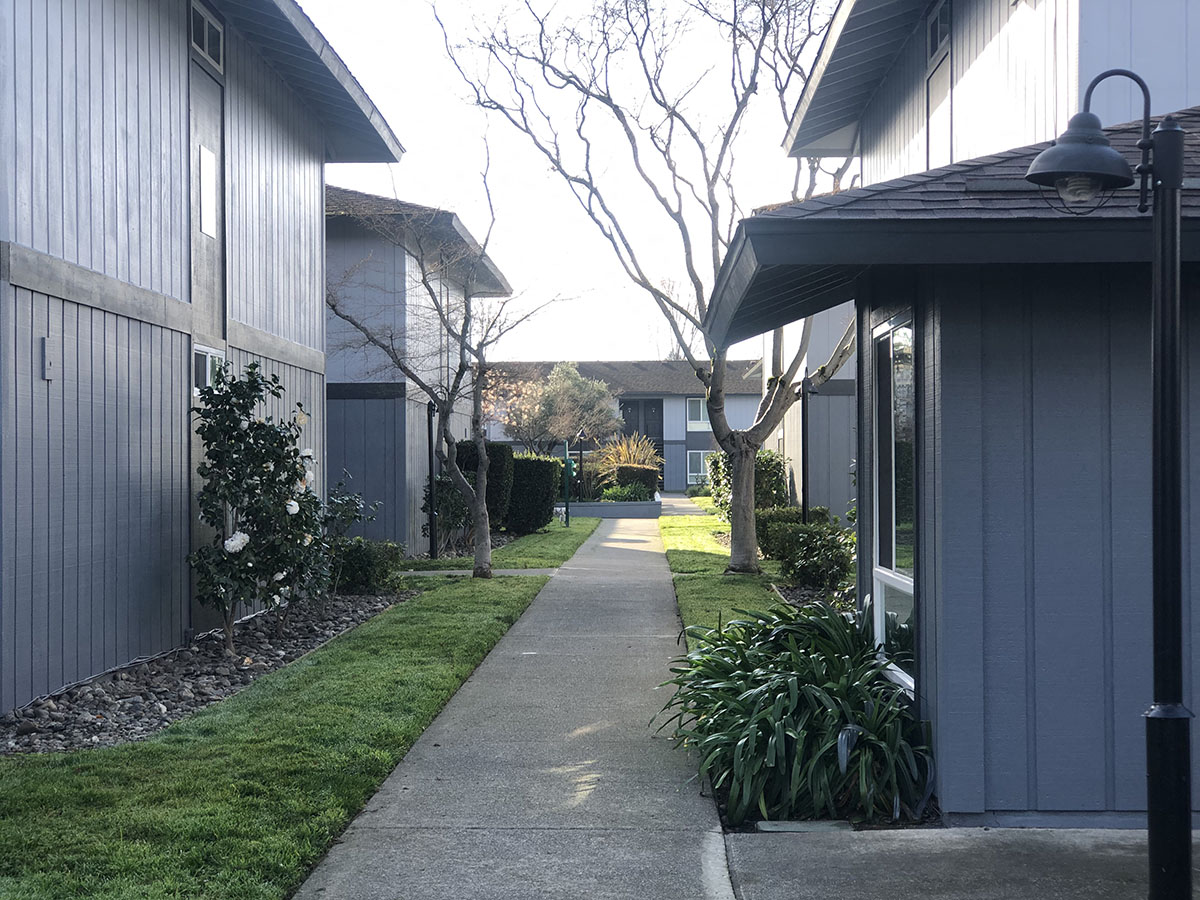 Sidewalk through apartment building with landscape l Bella Vista Napa