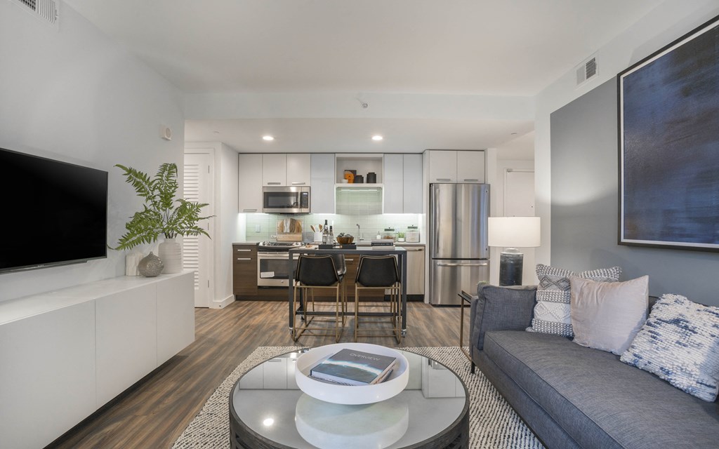 a living room with a couch and a table