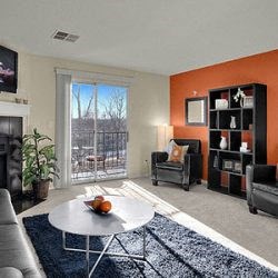 a living room with a couch and a table