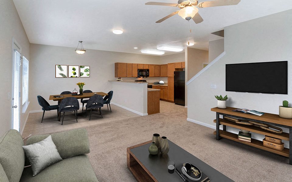 a living room with a table and a television