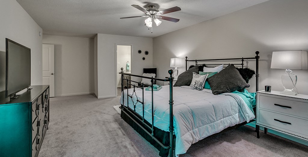 us census designated place bedroom with ample storage and a large bed